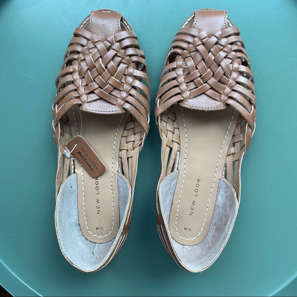 Brown flats closed toe woven